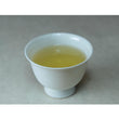 Load image into Gallery viewer, Cup of First Flush Oolong brewed from naturally grown tea leaves, floral and smooth aroma
