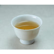 Load image into Gallery viewer, Cup of Hojicha brewed from naturally grown roasted tea leaves, warm and nutty aroma
