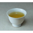 Load image into Gallery viewer, Cup of Spring Hojicha brewed from naturally grown roasted tea leaves, warm and lightly nutty aroma

